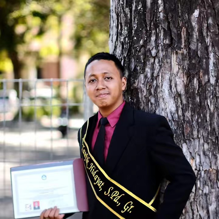 Muhammad Taufik Hidayat, S.Pd.