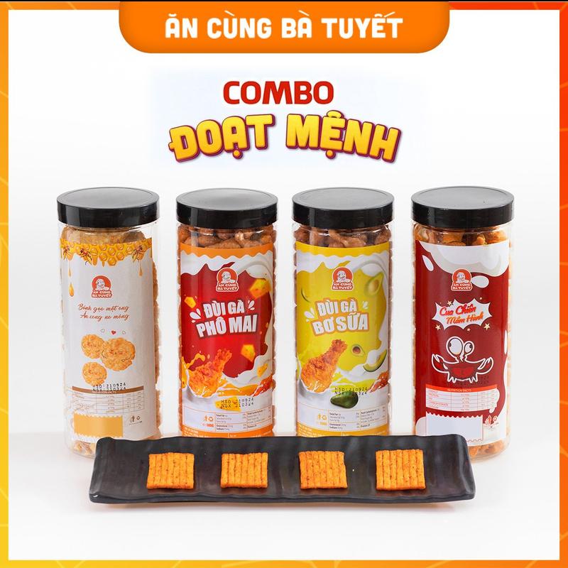 Combo ĐOẠT MỆNH gồm :1 hũ  Snack Đùi Gà PHÔ Mai +1 Hũ Snack Đùi Gà Bơ Sữa +1 Hũ Cua Chiên Mắm Hành +1 Hũ Bánh Gạo Mật Ong   -Đồ Ăn Vặt  Food Snack Ăn Cùng Bà Tuyết